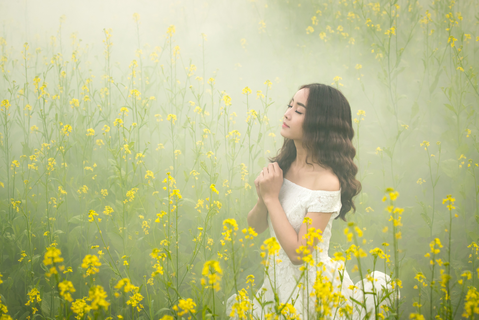 Girl in a Field of Yellow Flowers